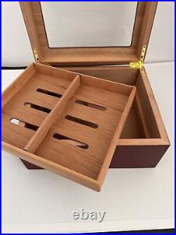Cherry wood Humidor holds up to 50 cigars Gently used Great life left 10x9x5