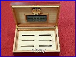 Cigar humidor set into a fine wooden case