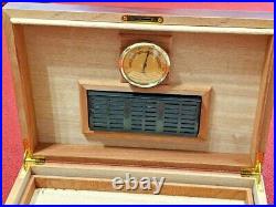Cigar humidor set into a fine wooden case