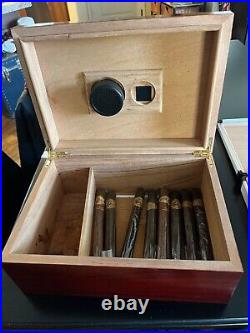 Cigars, humidors, and more. Selling as 1 lot
