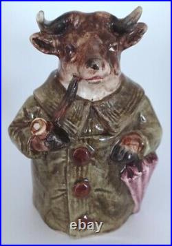 Pretty/Old Majolica Tobacco Humidor Bull with Pipe & Umbrella in Green Overcoat